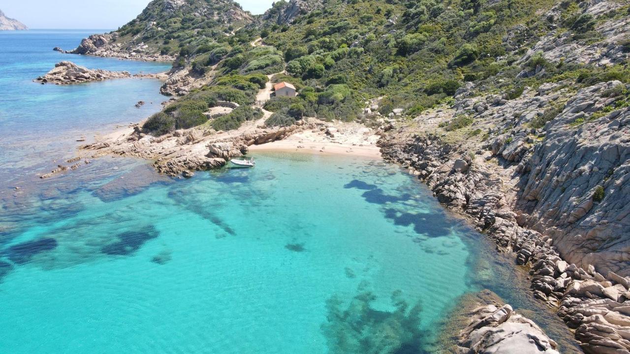 Aparthotel In With Swimming Pool In Cala Girgolu